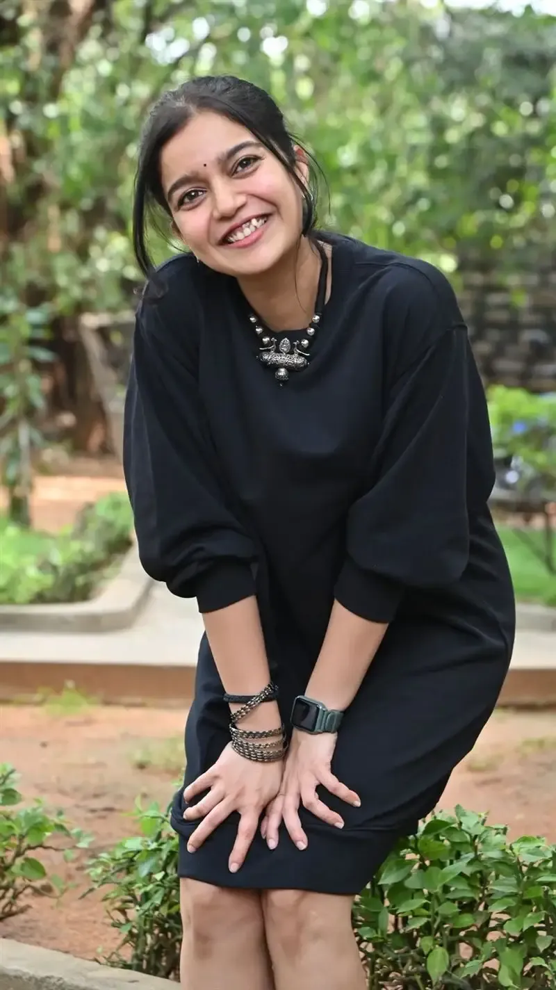 Actress Colors Swathi in Black Dress at Month Of Madhu Movie Press Meet